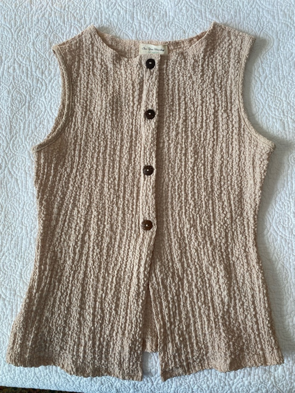 Nude sleeveless top